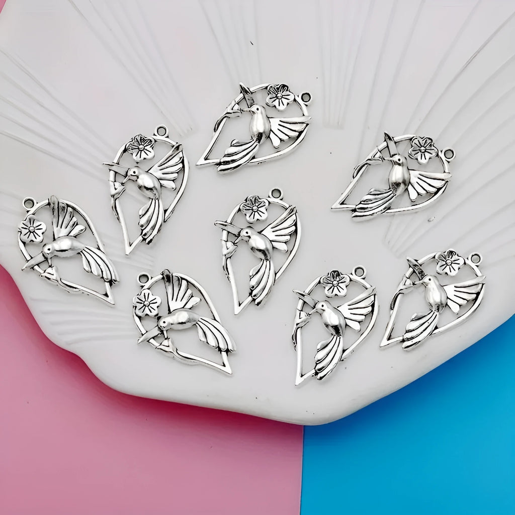 Alloy magpie pendant charm with electroplated finish in colour P234 for DIY jewellery crafting.