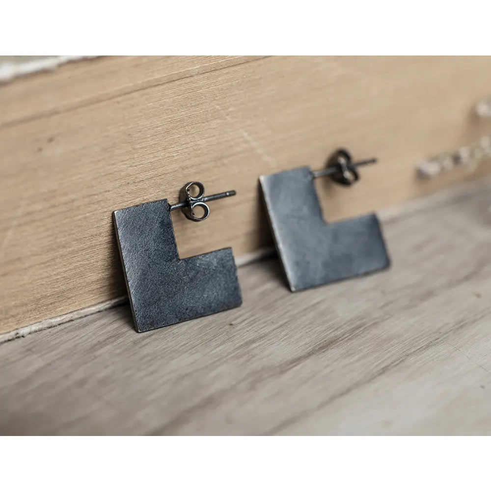 Oxidised black geometric square sterling silver earrings on a 16mm scale.