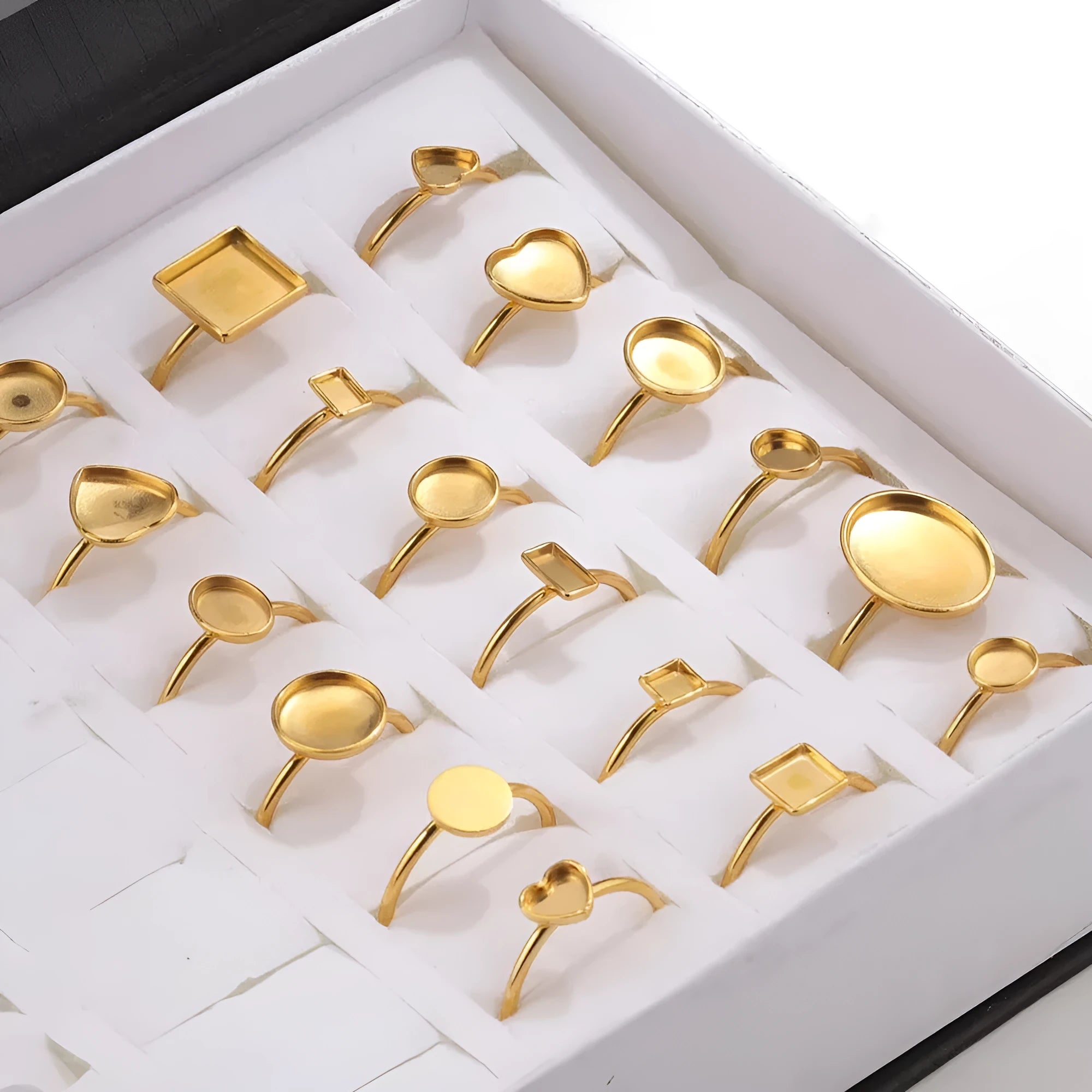 Stainless steel golden electroplated ring settings in multiple shapes including oval, heart, rectangle, round and square