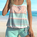 Women's sky blue striped swimsuit bikini with colour-split design on mannequin