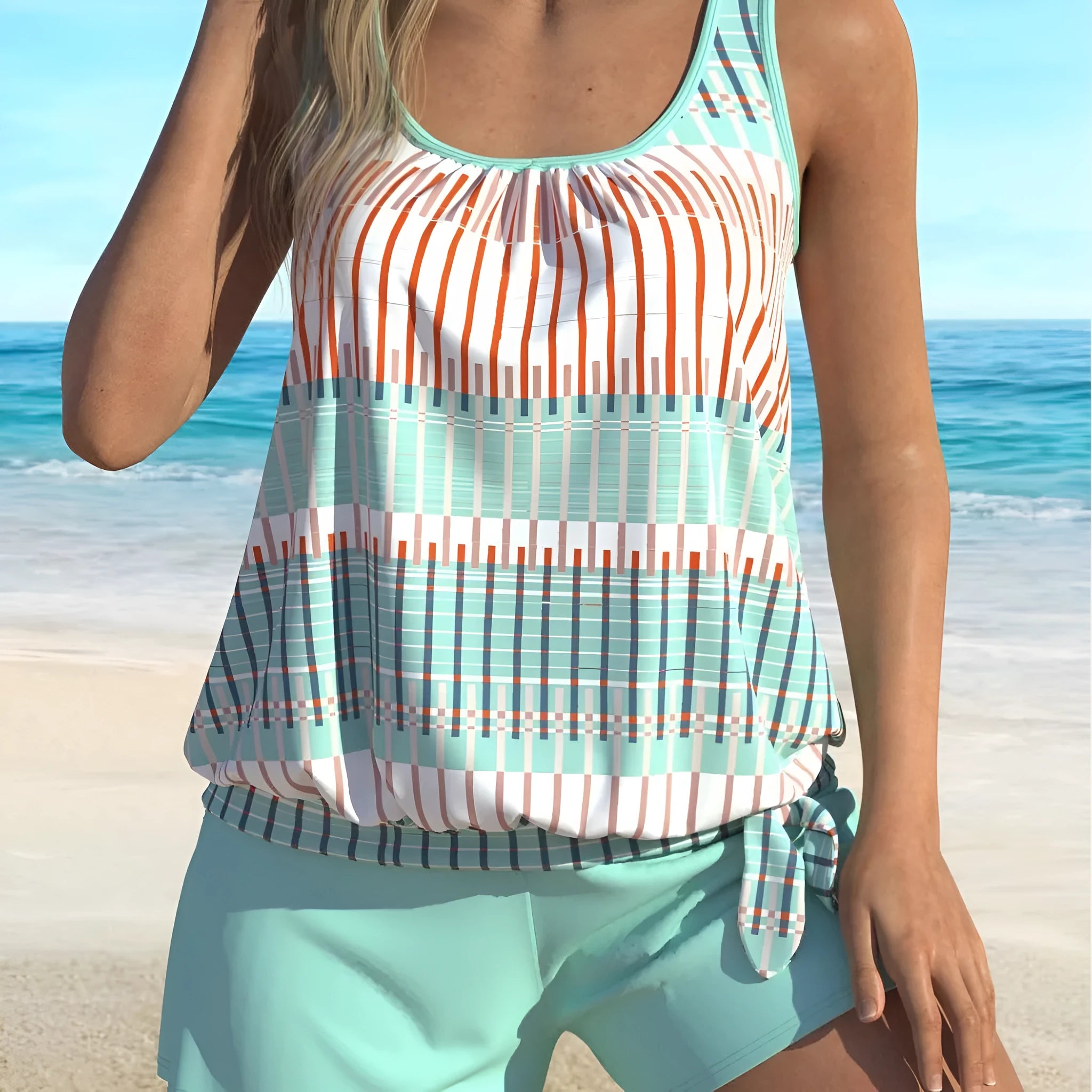 Women's sky blue striped swimsuit bikini with colour-split design on mannequin