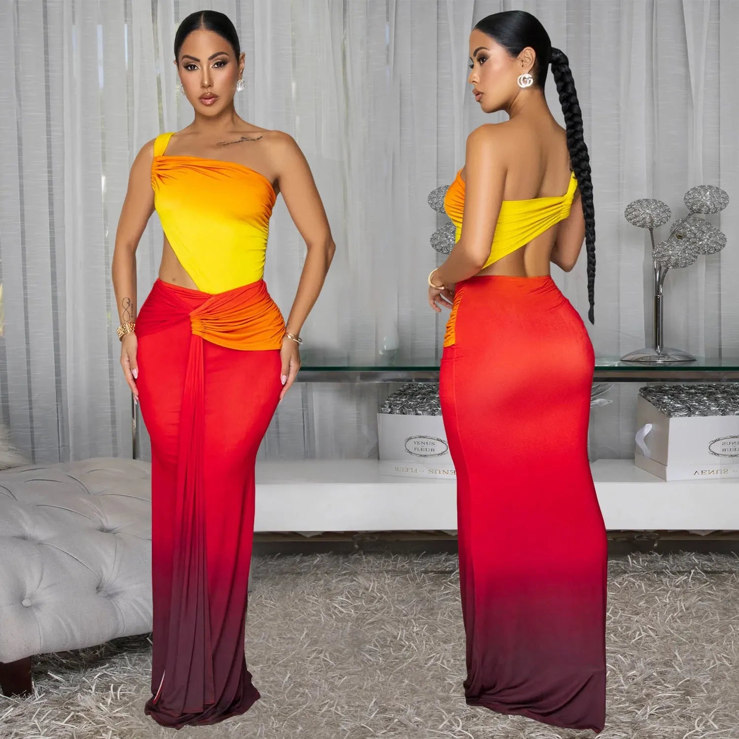 Brown gradient sleeveless dress with cross-shoulder straps and a long skirt on a model.