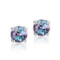 Simple geometric silver ear studs with a round Cultivate Alexandrite stone.