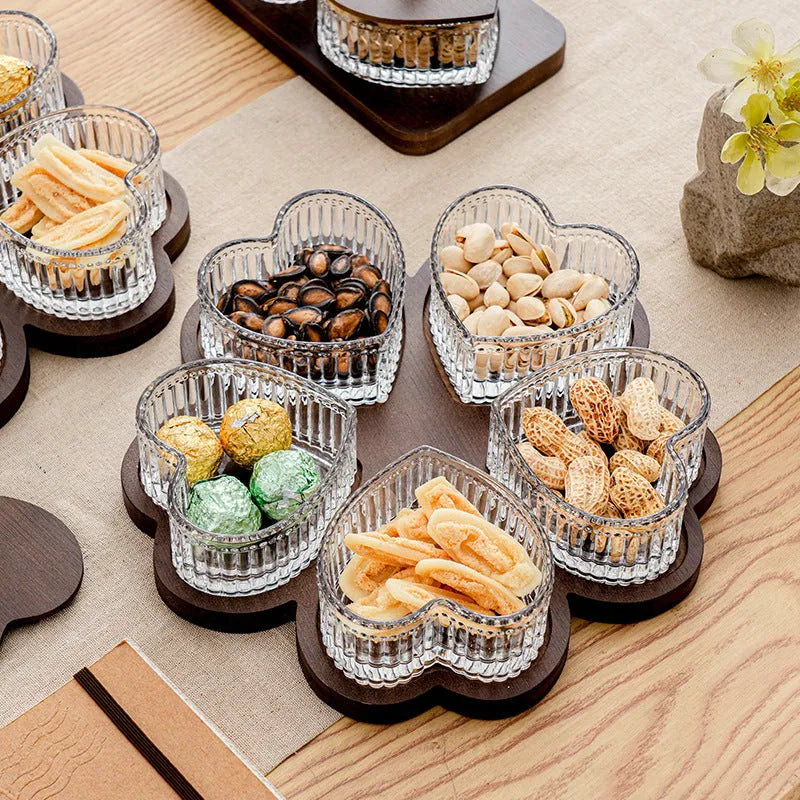 Glass snack plate with heart-shaped lids on a multi-grid tray in a retro style.