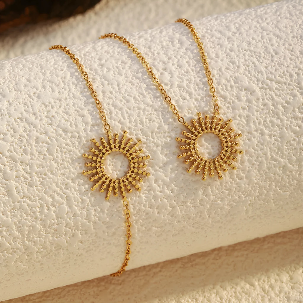 Gold tone geometric chain necklace and bracelet jewellery set for women