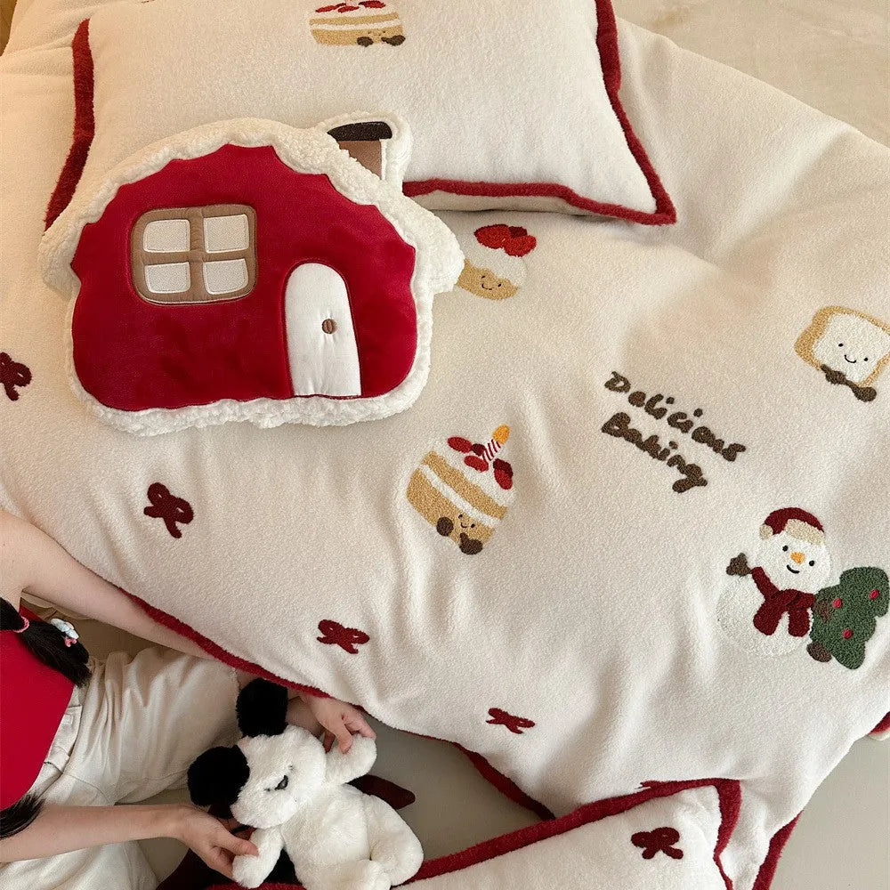 Girl's winter Christmas cartoon pattern bedding four-piece set showing duvet cover, sheet, and pillowcases