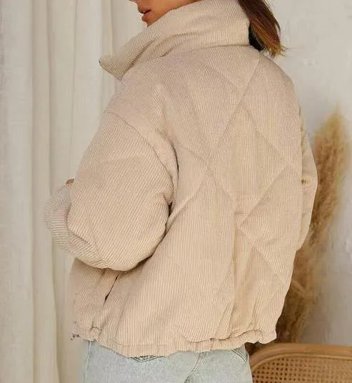 Women's apricot corduroy wadded jacket with stand collar and full-length front zipper.