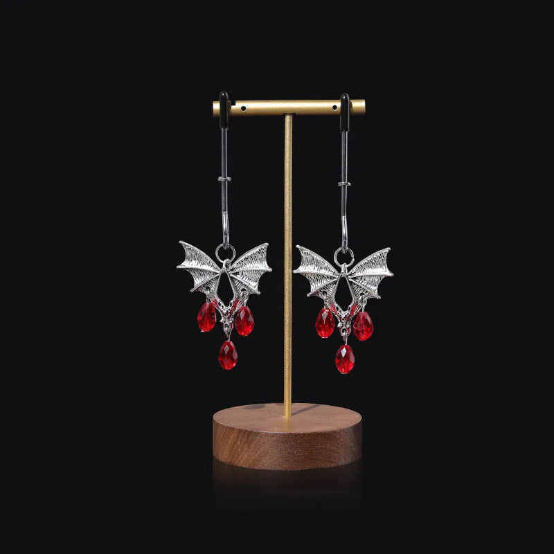 Silver alloy diamond bat nipple clamp with adjustable pressure and ruby bat decorative design