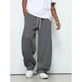 Men's casual polyester trousers with elastic waistband in straight leg design