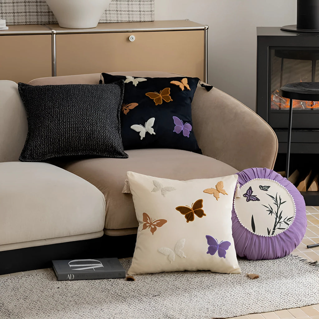 Square beige cushion with detailed Chinese butterfly embroidery design.