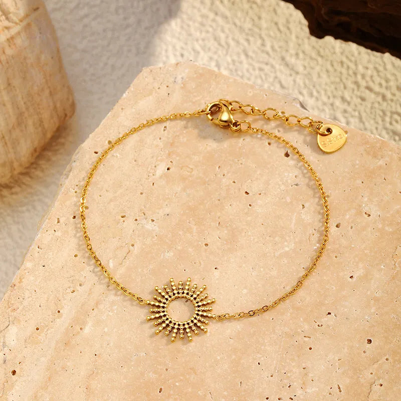 Gold tone geometric chain necklace and bracelet jewellery set for women