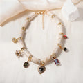 Resin bamboo necklace with heart-shaped pendant and electroplated finish