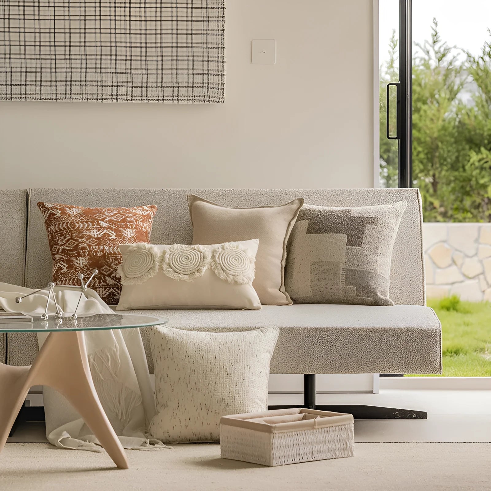 Coreless pillow cushion with pp cotton filler in solid colours on a sofa.