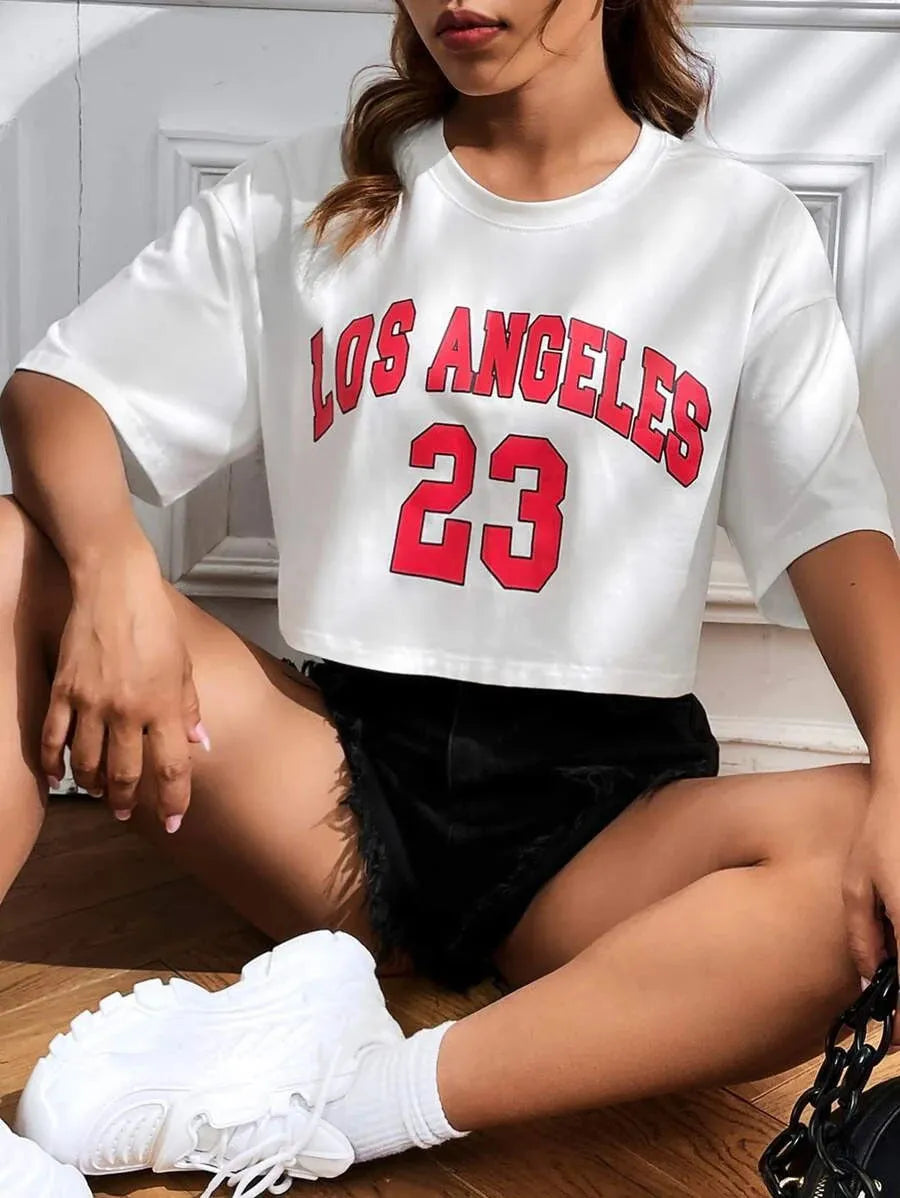 Loose fit cotton t-shirt with large printed English letters on the front in a casual style.
