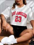 Loose fit cotton t-shirt with large printed English letters on the front in a casual style.