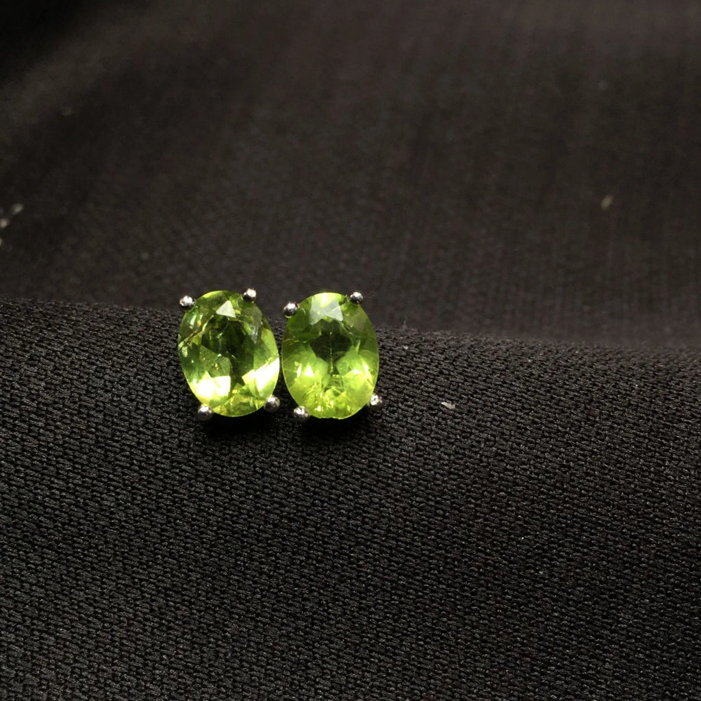 Natural grass green olivine stud earrings in S925 sterling silver geometric setting.