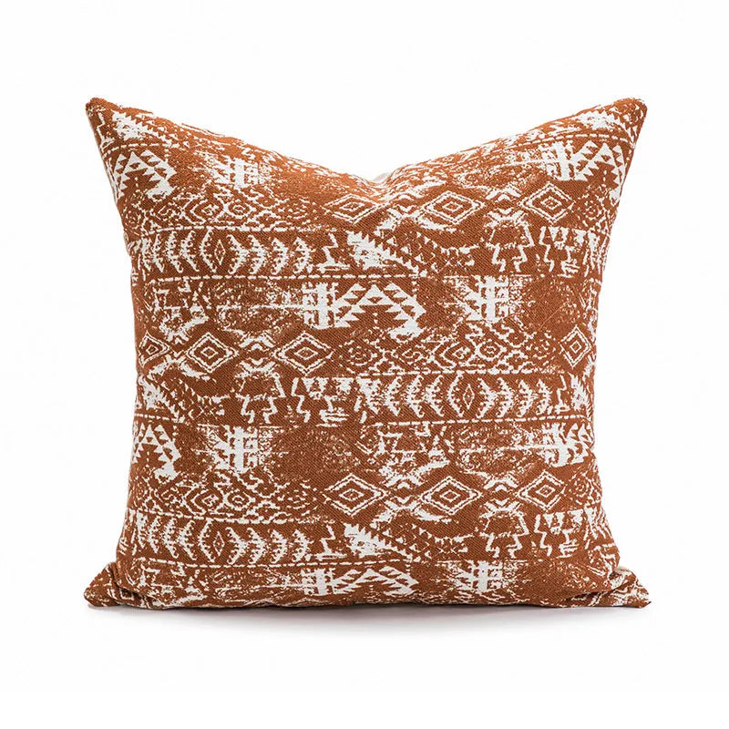 Coreless pillow cushion with pp cotton filler in solid colours on a sofa.