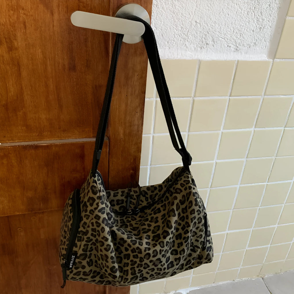 Large capacity leopard print sports style shoulder messenger bag with breathable cloth and stitching details