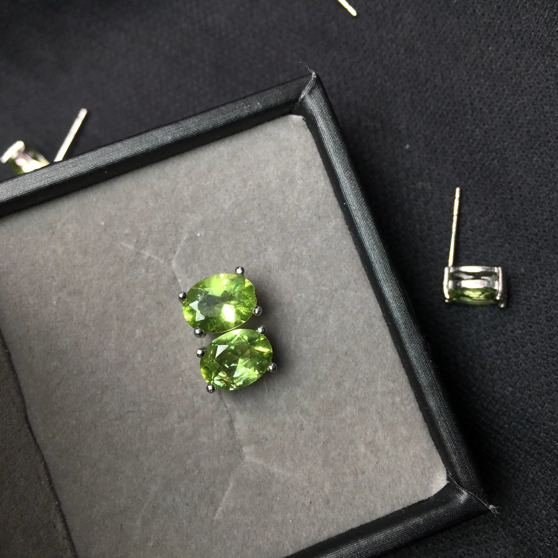 Natural grass green olivine stud earrings in S925 sterling silver geometric setting.