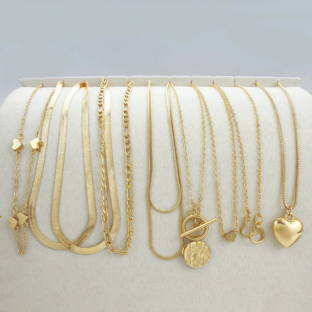 10-piece gold electroplated women's necklace set with snake bone chains and alloy pendants
