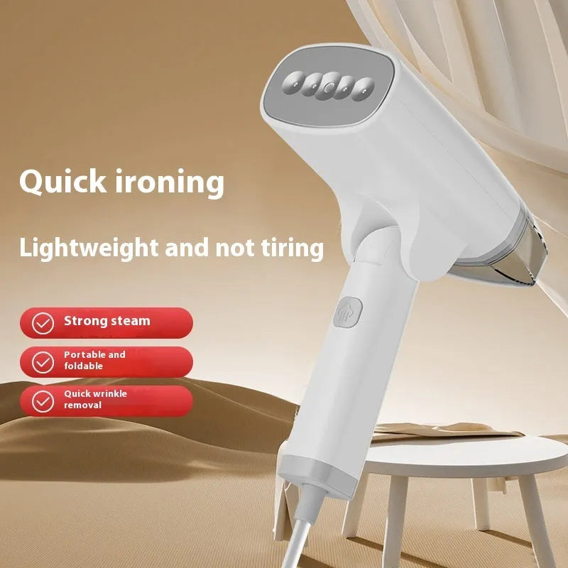 Blue and white handheld garment steamer with mechanical controls and 1300W power rating