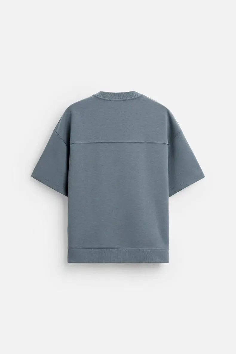 Loose-fitting polyester co-ord set with short sleeve T-shirt and matching shorts in four colour options