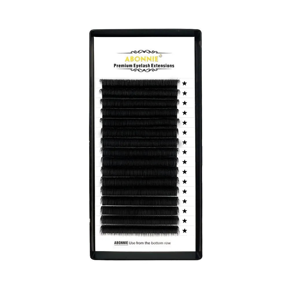 Close-up of 16-row dense mink hair false eyelashes on a matte round wool band.