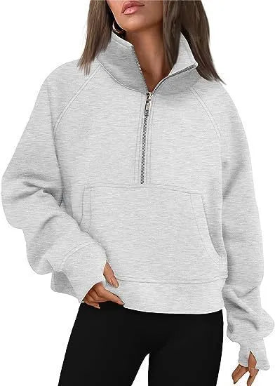 Women's loose lapel fleece-lined sweater in a solid colour showing raglan sleeve design.