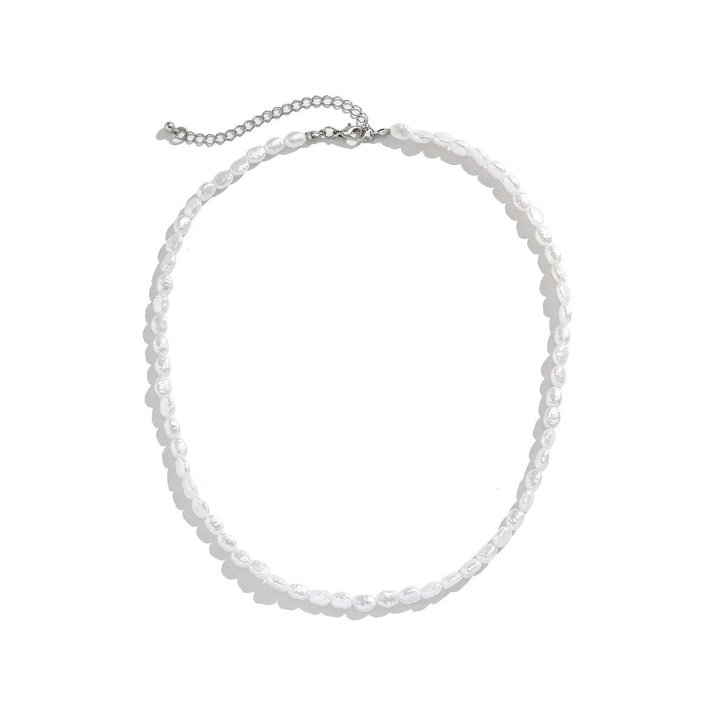 White U-shaped men's imitation pearl necklace with shellfish pendant on clavicle