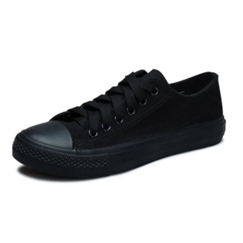 Women's solid colour canvas casual shoes in black, white black, white red, and all black colourways