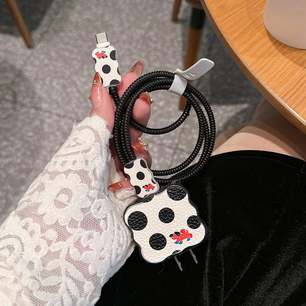 Lambskin USB fast charger protection sleeve with cartoon puppy design on a white background.