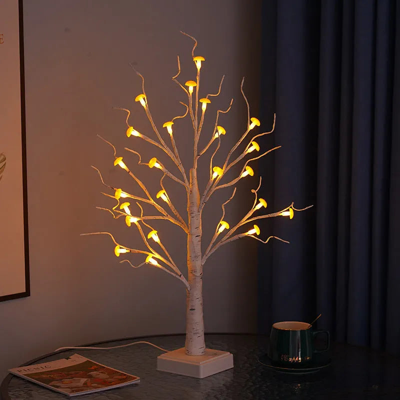 60cm tall white LED mushroom tree lamp with many small detachable mushroom flowers on a wooden table.