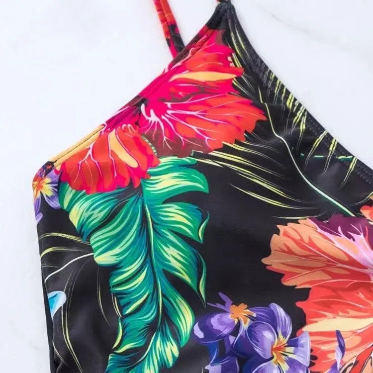 Black women's high waist bikini briefs on a plain background.