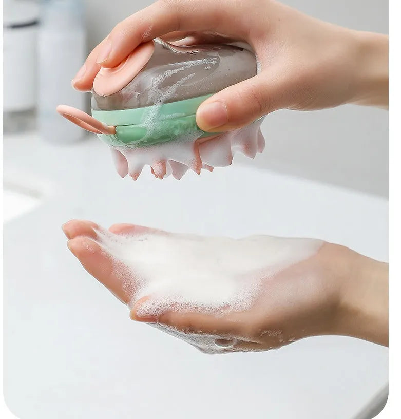 Blue and green pet grooming brush with shampoo dispenser for dogs and cats.
