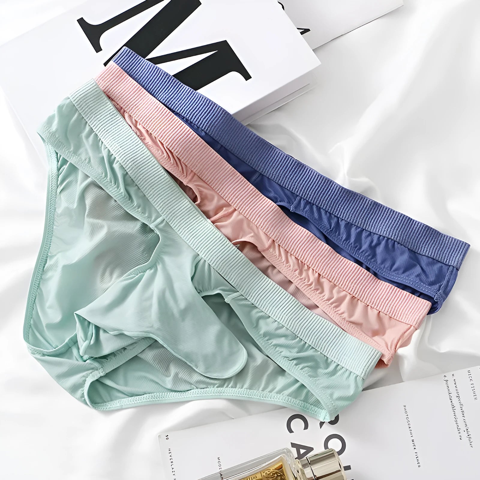 Men's low waist Ice Silk briefs in light green colour showing the front design