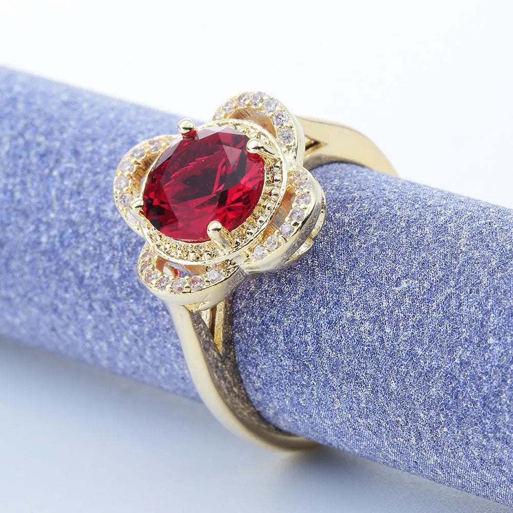 Close-up of a copper fruit-shaped ring with a central zircon stone in colour 10-6-1395.