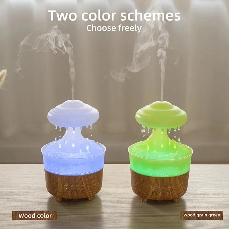 Wood grain white rain cloud-shaped ultrasonic humidifier diffuser with LED lights on a table.