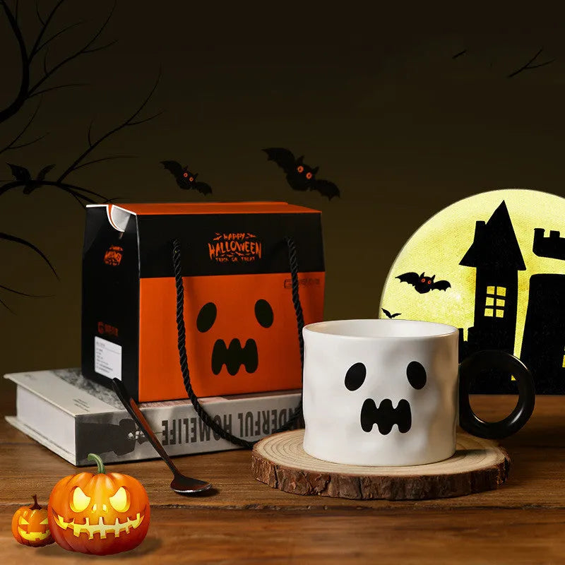 Orange ceramic Halloween pumpkin mug with handle and gift box.