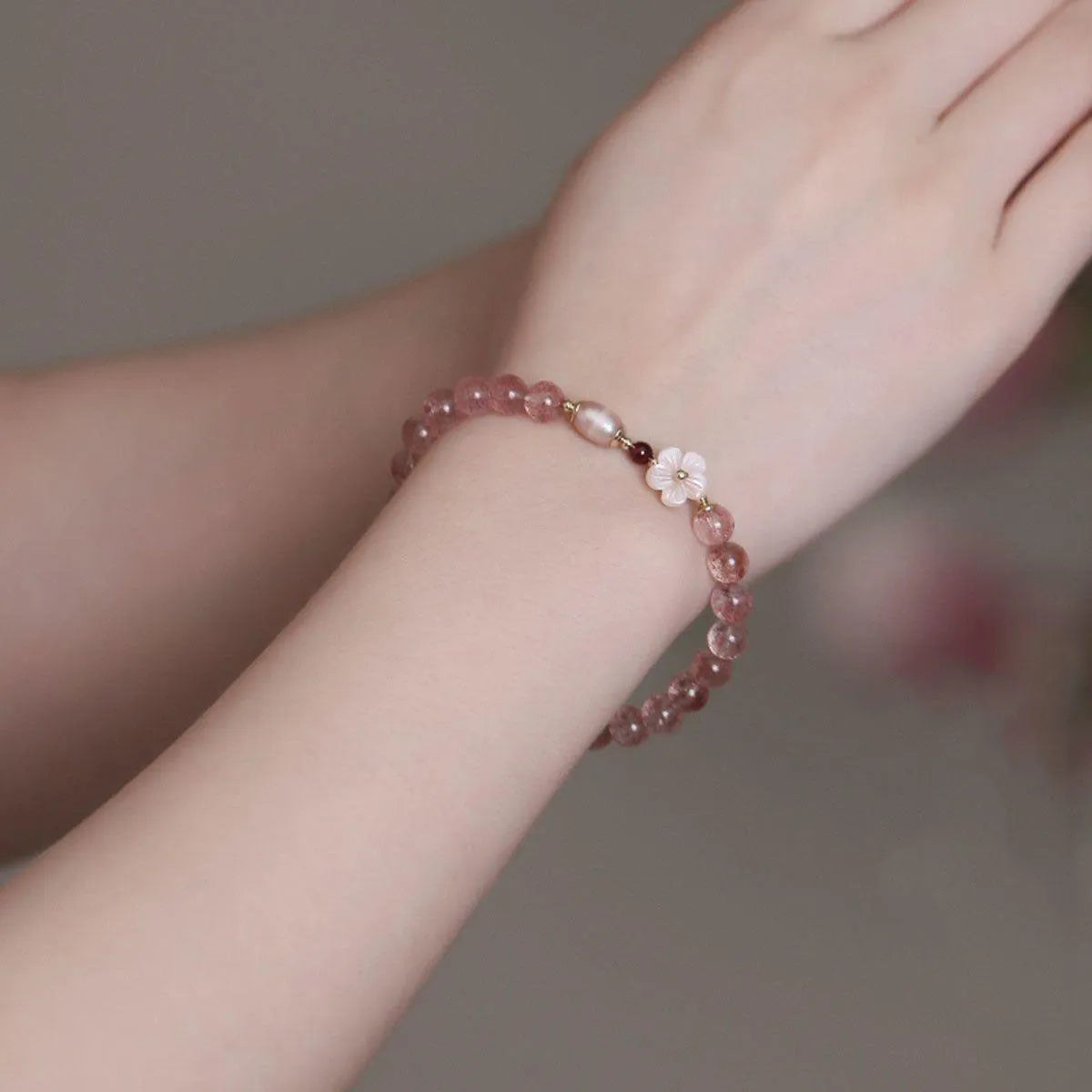 Strawberry quartz peach blossom crystal bracelet with flower-shaped beads for casual jewellery wear
