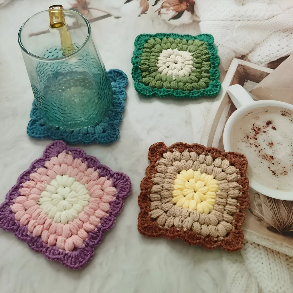 Crocheted wool insulated cup placemat with grandmother lattice pattern in colour choice