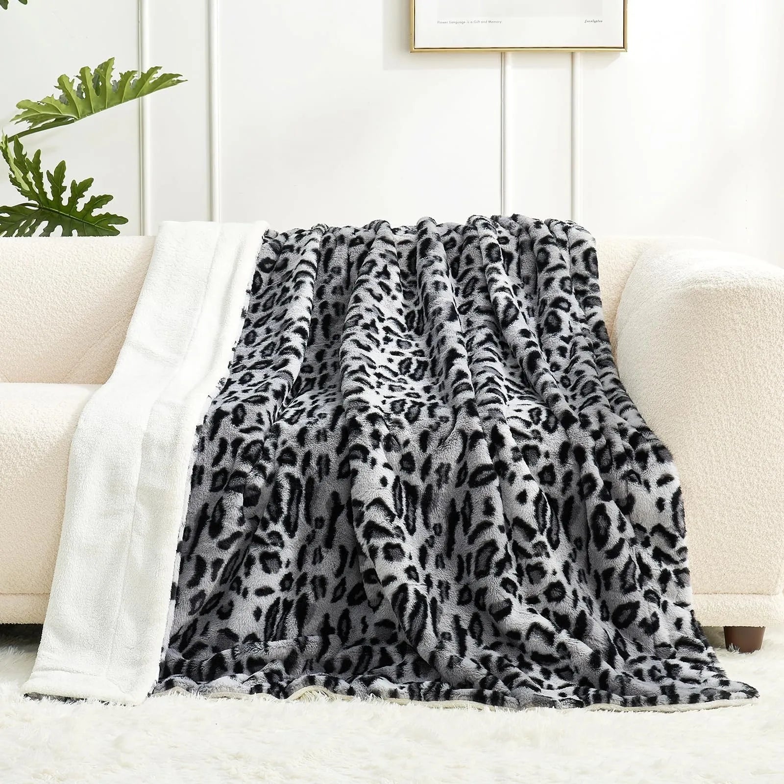 White flannel blanket with animal stripe pattern on a sofa