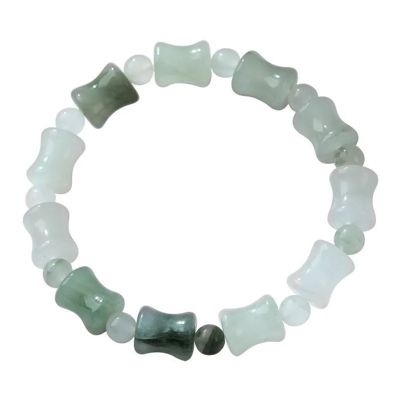 Natural jade and coconut shell beaded bracelet with safety lock clasp on wrist.