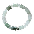 Natural jade and coconut shell beaded bracelet with safety lock clasp on wrist.