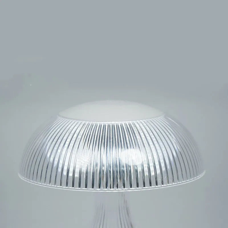 White USB rechargeable acrylic table lamp with three-colour changing LED light, dimensions 20cm by 16cm.