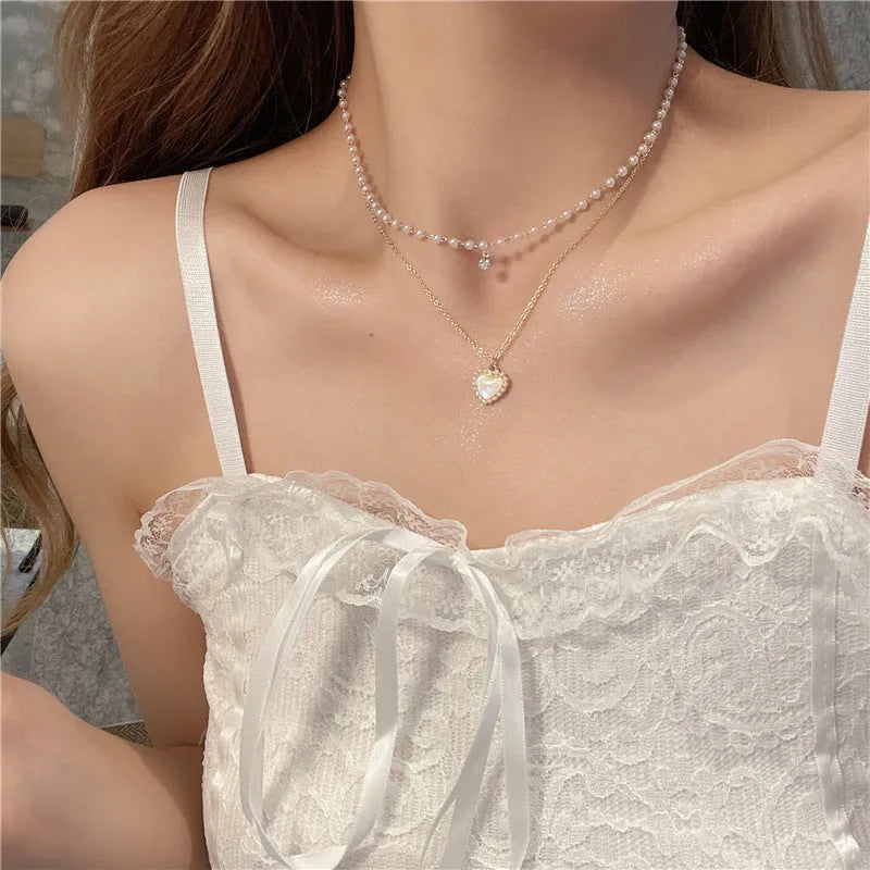Gold electroplated heart-shaped double-layer necklace on woman, zinc alloy, adjustable 21-50 cm circumference
