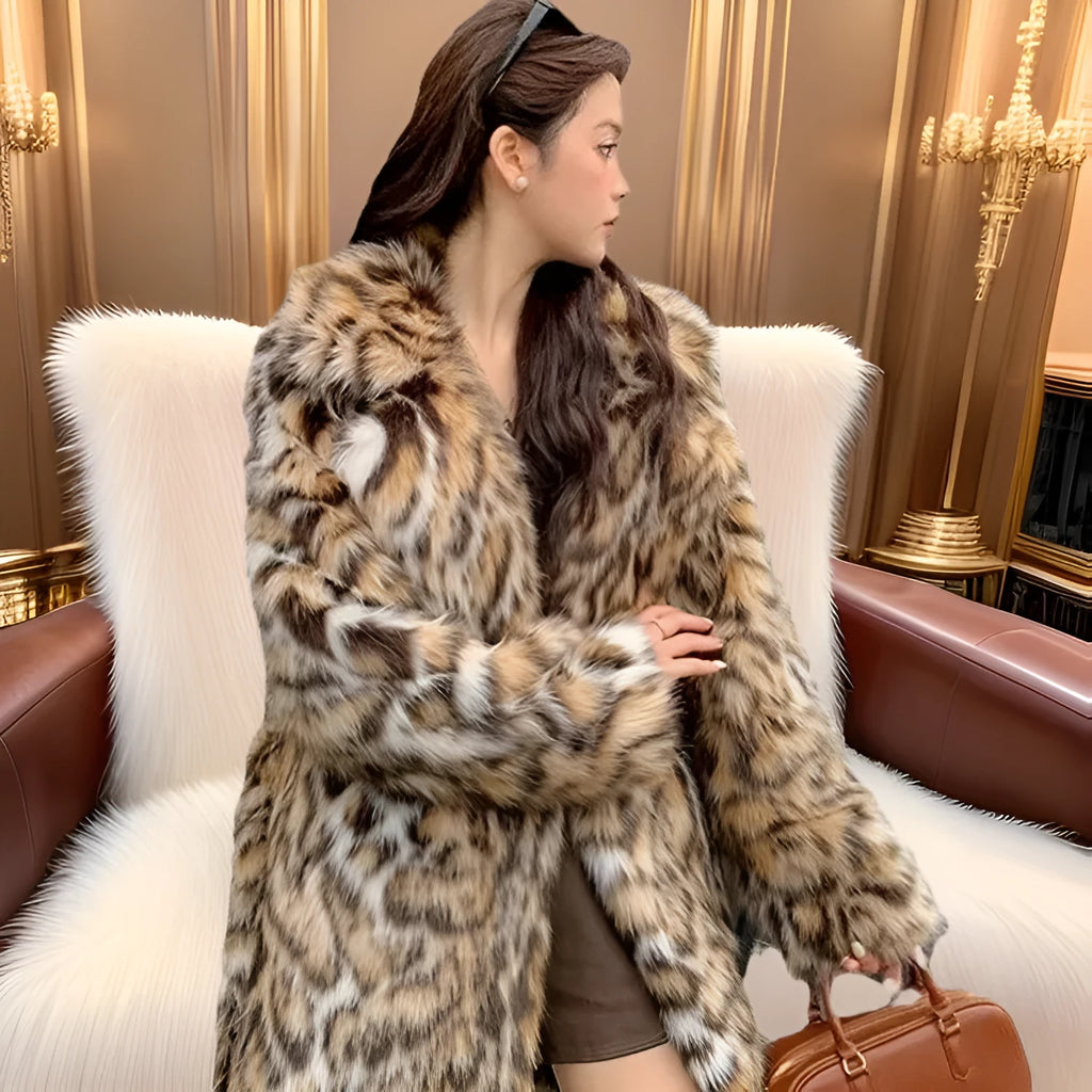 Long faux fur coat with fur collar and pockets in artificial fur fabric
