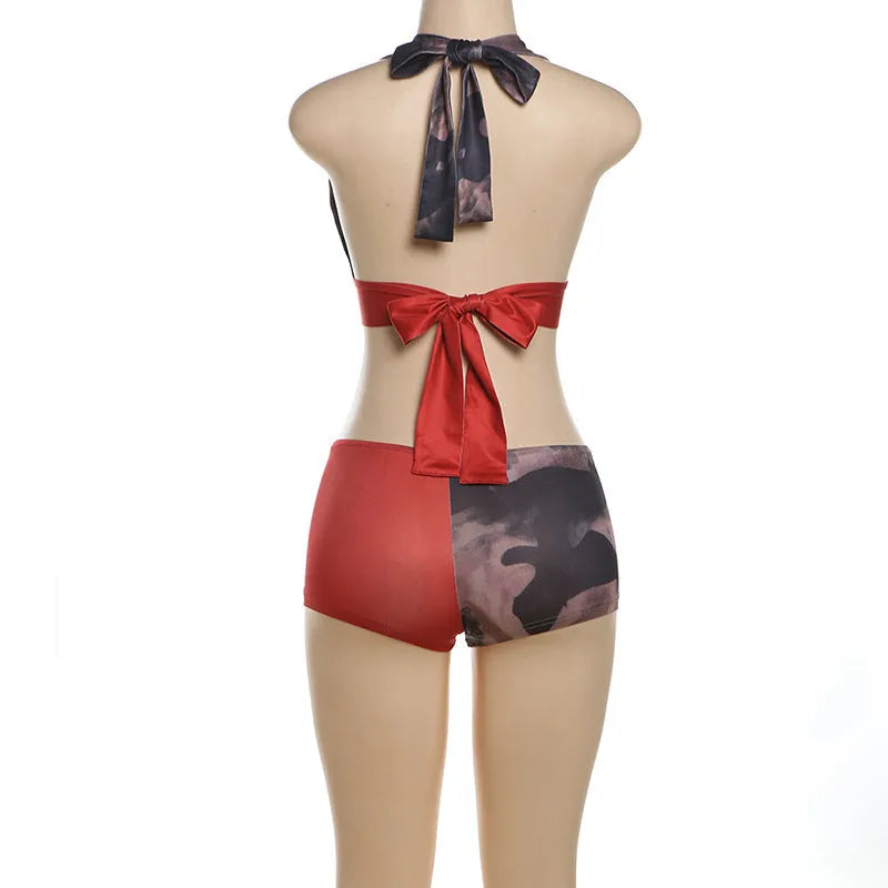 Red women's high waist bikini shorts set with 3D printed pattern, shown on a hanger.