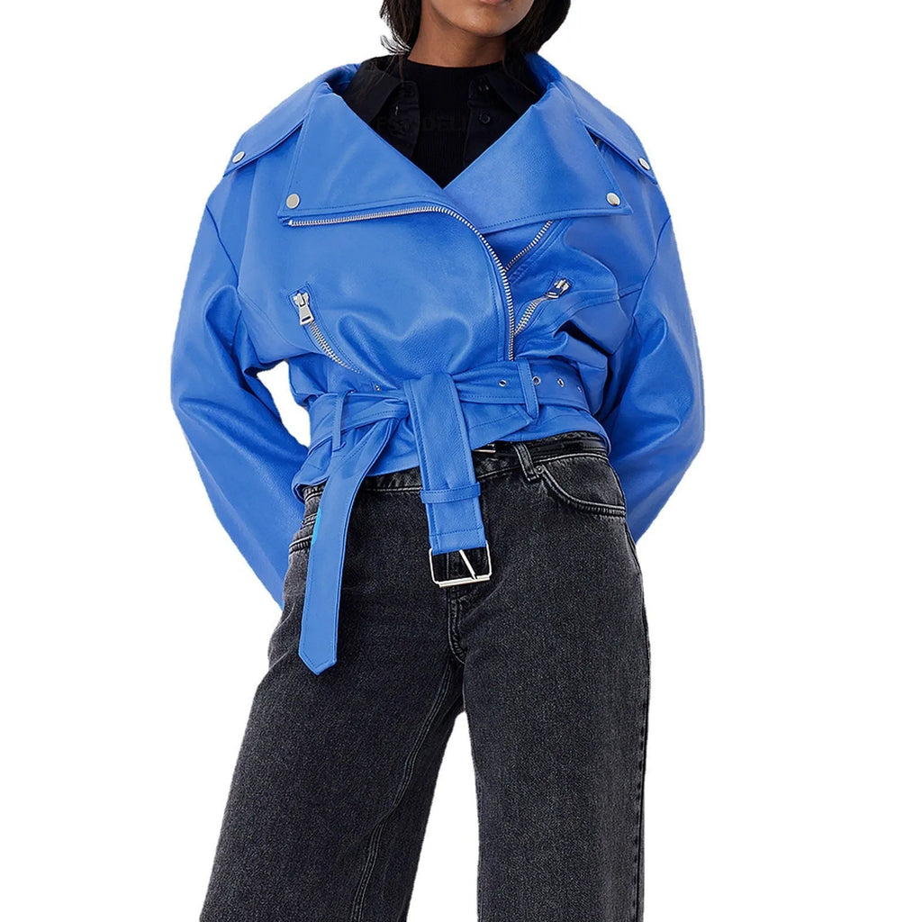 Black punk style short jacket with a belt-fastened lapel and Peter Pan collar.