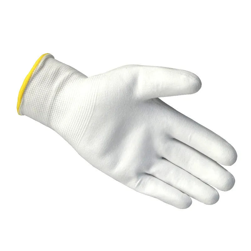 White PU-coated labour gloves showing flexible design and 24cm length on work surface
