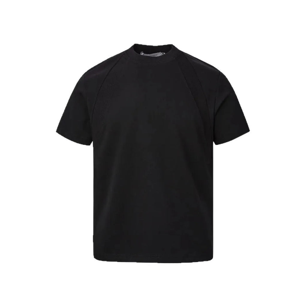 Loose fit short sleeve polyester top in black, shown on a model